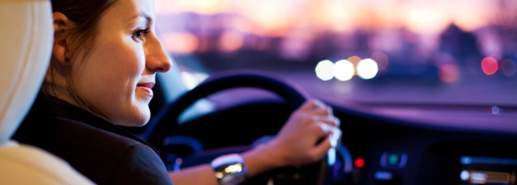 Woman Driving at Dusk