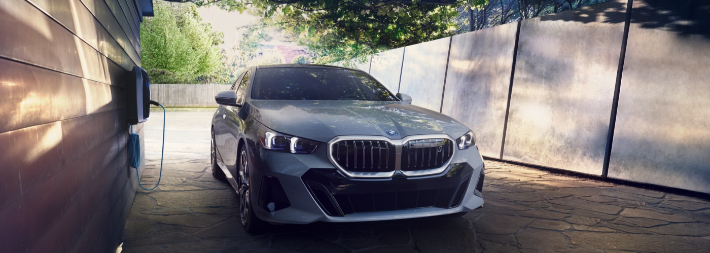 2024 BMW i5 Charging in the Driveway