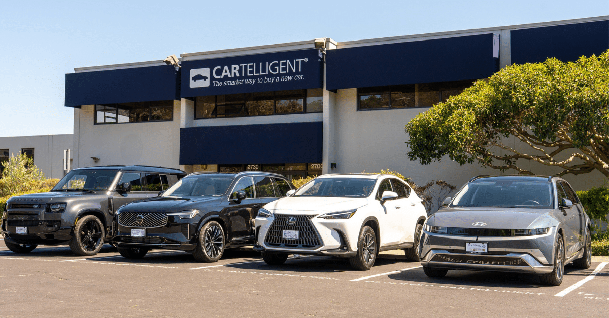 Cartelligent auto broker Sausalito office with new cars in parking lot